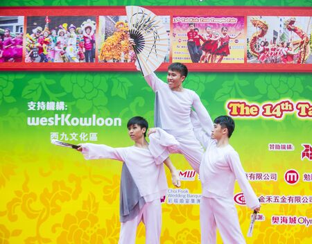 HONG KONG - MARCH 04 : Participants in the 14th Tai Kok Tsui temple fair in Hong Kong on March 04 2018. The temple fair is a Chinese cultural event held annuallyのeditorial素材