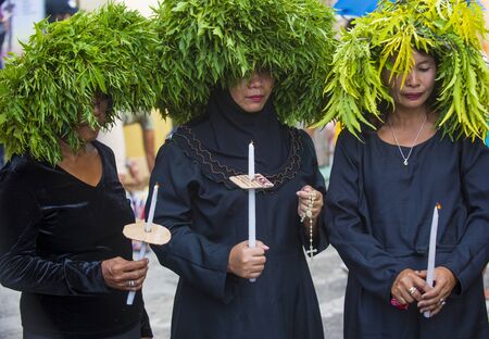 GASAN , PHILIPPINES - MARCH 30 : Participants in a Good Friday procession in Gasan, Marinduque...