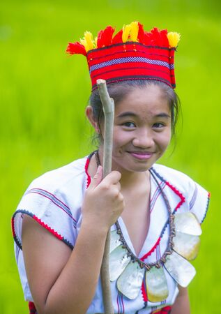 BANAUE, PHILIPPINES - MAY 02 : Woman from Ifugao Minority near a rice terraces in Banaue the Philippines on May 02 2018. The Ifugao minority mostly live in the mountains of north Philippinesのeditorial素材