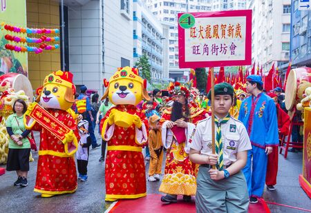 HONG KONG - MARCH 04 : Participants in the 14th Tai Kok Tsui temple fair in Hong Kong on March 04 2018. The temple fair is a Chinese cultural event held annuallyのeditorial素材