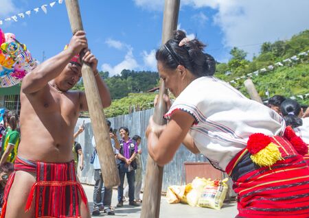 BANAUE, PHILIPPINES - April 30 : People from Ifugao Minority in a rice pounding competion during Imbayah festival in Banaue the Philippines on April 30 2018.のeditorial素材