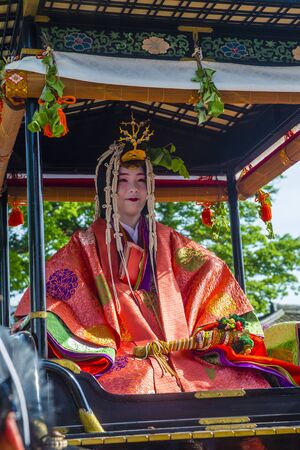 KYOTO - MAY 15 : Participant in Aoi Matsuri in Kyoto, Japan on May 15 2018. Aoi Mastsuri is one of the three main annual festivals held in Kyoto, Japanのeditorial素材