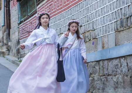 SEOUL - MAY 10 : Korean women wearing Hanbok dress in Seoul Korea on May 10 2018. Hanbok is a Korean traditional clothing It is characterized by vibrant colors and simple linesのeditorial素材