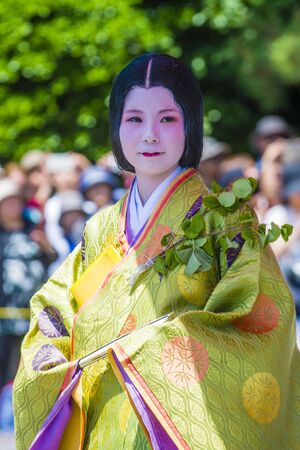 KYOTO - MAY 15 : Participant in Aoi Matsuri in Kyoto, Japan on May 15 2018. Aoi Mastsuri is one of the three main annual festivals held in Kyoto, Japanのeditorial素材