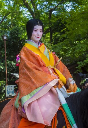 KYOTO - MAY 15 : Participant in Aoi Matsuri in Kyoto, Japan on May 15 2018. Aoi Mastsuri is one of the three main annual festivals held in Kyoto, Japanのeditorial素材