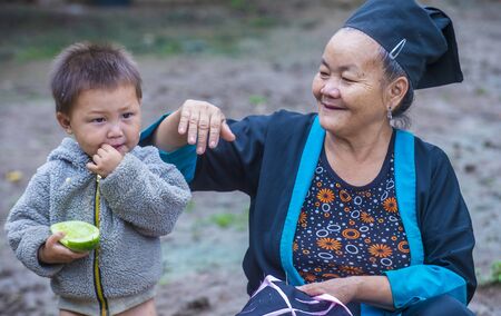 BAM NA OUAN , LAOS - AUG 13 : Woman from the Hmong Minority in Bam Na Ouan village Laos on August 13 2018. The Hmong minority is one of the 49 ethnic groups of Laosのeditorial素材