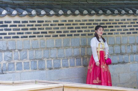 SEOUL - MAY 10 : Korean woman wearing Hanbok dress in Seoul Korea on May 10 2018. Hanbok is a Korean traditional clothing It is characterized by vibrant colors and simple linesのeditorial素材