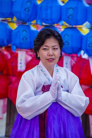 SEOUL - MAY 11 : Woman with traditional costume at Jogyesa Temple during Lotus Lantern Festival in Seoul , Korea on May 11 2018  The festival is a celebration of the birth of Buddhaのeditorial素材