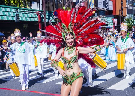 TOKYO - AUG 25 : Participants in the Asakusa samba carnival in Tokyo Japan on August 25 2018. The Asakusa samba carnival is the largest of its kind in the northern hemisphere.のeditorial素材
