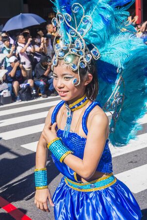 TOKYO - AUG 25 : Participant in the Asakusa samba carnival in Tokyo Japan on August 25 2018. The Asakusa samba carnival is the largest of its kind in the northern hemisphere.のeditorial素材