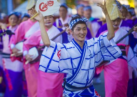 TOKYO - AUG 26 : Participants in the Awa Odori festival in Tokyo, Japan on August 26 2018. Awa Odori is the largest dance festival in Japanのeditorial素材