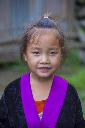 BAM NA OUAN , LAOS - AUG 13 : Girl from the Hmong Minority in Bam Na Ouan village Laos on August 13 2018. The Hmong minority is one of the 49 ethnic groups of Laosのeditorial素材