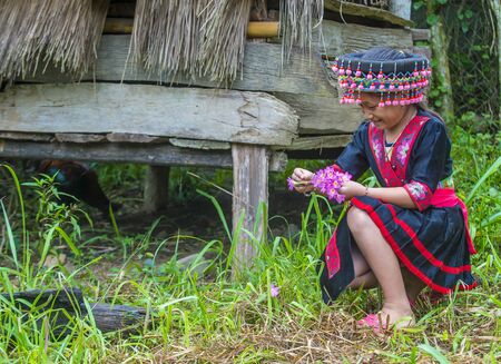 BAM NA OUAN , LAOS - AUG 13 : Girl from the Hmong Minority in Bam Na Ouan village Laos on August 13 2018. The Hmong minority is one of the 49 ethnic groups of Laosのeditorial素材