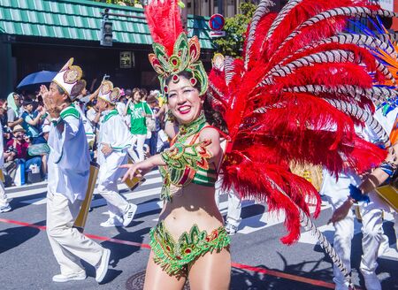 TOKYO - AUG 25 : Participants in the Asakusa samba carnival in Tokyo Japan on August 25 2018. The Asakusa samba carnival is the largest of its kind in the northern hemisphere.のeditorial素材