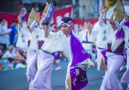 TOKYO - AUG 26 : Participants in the Awa Odori festival in Tokyo, Japan on August 26 2018. Awa Odori is the largest dance festival in Japanのeditorial素材