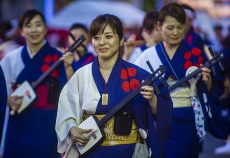 TOKYO - AUG 26 : Participants in the Awa Odori festival in Tokyo, Japan on August 26 2018. Awa Odori is the largest dance festival in Japanのeditorial素材