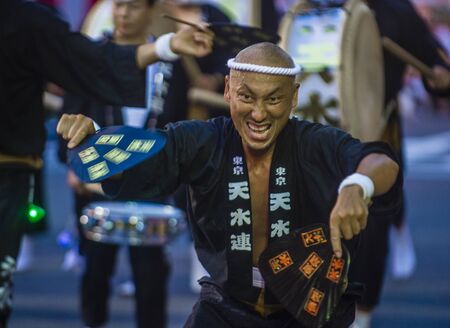 TOKYO - AUG 26 : Participants in the Awa Odori festival in Tokyo, Japan on August 26 2018. Awa Odori is the largest dance festival in Japanのeditorial素材