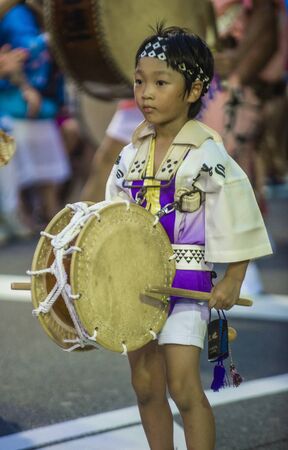 TOKYO - AUG 26 : Participant in the Awa Odori festival in Tokyo, Japan on August 26 2018. Awa Odori is the largest dance festival in Japanのeditorial素材