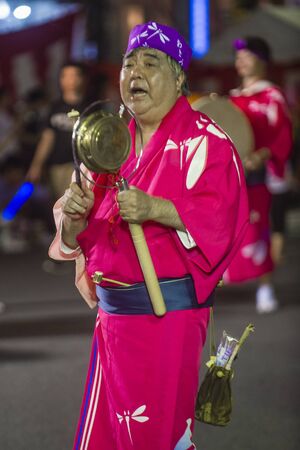 TOKYO - AUG 26 : Participant in the Awa Odori festival in Tokyo, Japan on August 26 2018. Awa Odori is the largest dance festival in Japanのeditorial素材