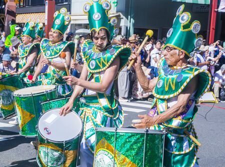TOKYO - AUG 25 : Participants in the Asakusa samba carnival in Tokyo Japan on August 25 2018. The...