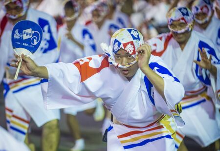 TOKYO - AUG 26 : Participants in the Awa Odori festival in Tokyo, Japan on August 26 2018. Awa Odori is the largest dance festival in Japanのeditorial素材