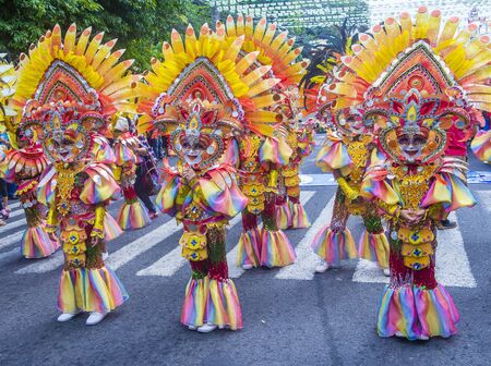 BACOLOD , PHILIPPINES - OCT 28 : Participants in the Masskara Festival in Bacolod Philippines on October 28 2018. Masskara is an annual festival held every fourth Sunday of Octoberのeditorial素材