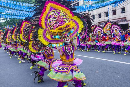 BACOLOD , PHILIPPINES - OCT 28 : Participants in the Masskara Festival in Bacolod Philippines on October 28 2018. Masskara is an annual festival held every fourth Sunday of Octoberのeditorial素材