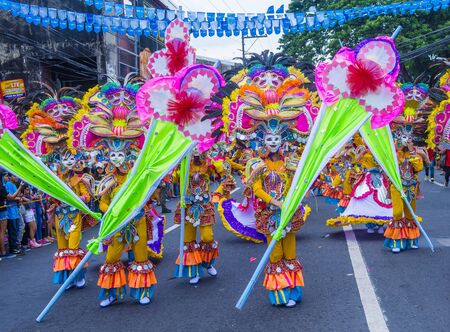 BACOLOD , PHILIPPINES - OCT 28 : Participants in the Masskara Festival in Bacolod Philippines on October 28 2018. Masskara is an annual festival held every fourth Sunday of Octoberのeditorial素材