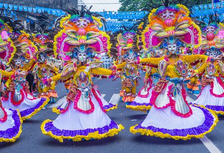 BACOLOD , PHILIPPINES - OCT 28 : Participants in the Masskara Festival in Bacolod Philippines on October 28 2018. Masskara is an annual festival held every fourth Sunday of Octoberのeditorial素材