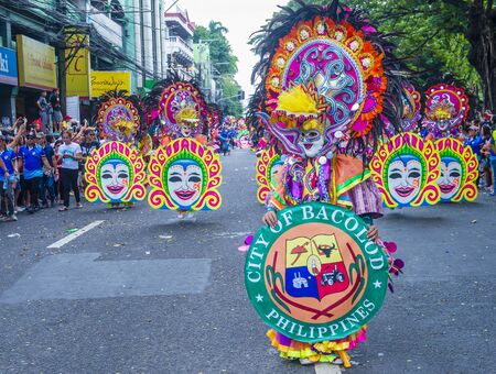 BACOLOD , PHILIPPINES - OCT 28 : Participants in the Masskara Festival in Bacolod Philippines on October 28 2018. Masskara is an annual festival held every fourth Sunday of Octoberのeditorial素材