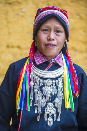 HA GIANG , VIETNAM - SEP 14 : Woman from the Red Dao minority in a village near Ha Giang in Vietnam on September 14 2018. The Red Dao is one of the 54 ethnic groups of Vietnamのeditorial素材