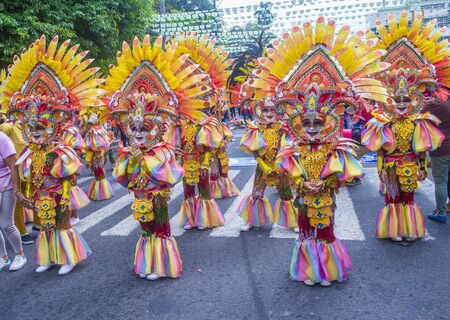 BACOLOD , PHILIPPINES - OCT 28 : Participants in the Masskara Festival in Bacolod Philippines on October 28 2018. Masskara is an annual festival held every fourth Sunday of Octoberのeditorial素材