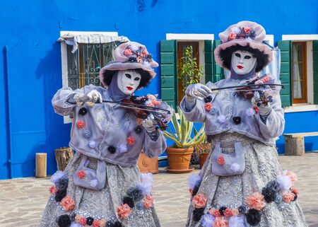 VENICE, ITALY - FEB 26 : Participants in the Venice Carnival in Venice , Italy on February 26 2019. The Venice Carnival is world-famous for itâs elaborate masksのeditorial素材