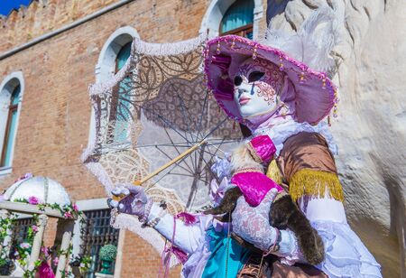 VENICE, ITALY - FEB 26 : Participant in the Venice Carnival in Venice , Italy on February 26 2019. The Venice Carnival is world-famous for itâs elaborate masksのeditorial素材