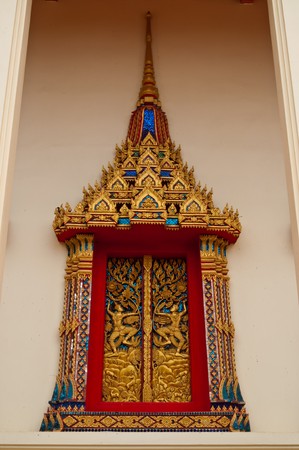 Thai art on window at Thailandの写真素材