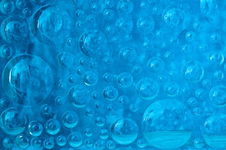 Blue color bubble in glass block, Thailand.の写真素材