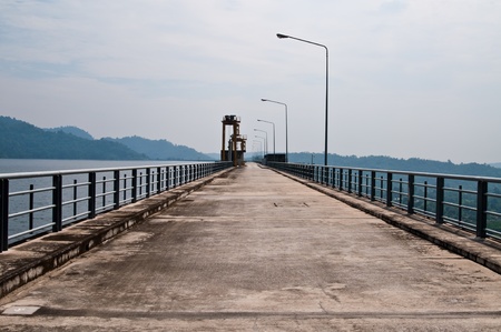 Road on dam in country, Thailand.の写真素材