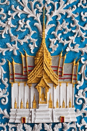 Temple molding art on the wall, Thailand.の写真素材