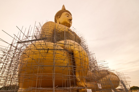 Renovation of big buddha statue at Wat Muang, Thailand.の写真素材