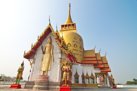 Golden Thai church with blue sky at Watprongaregard temple, Thailand.の写真素材