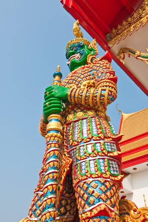 Green giant with golden dress, Thailand.の写真素材