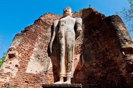 Standing buddha statue Wat Phra Si Ariyabot temple, Thailand.の写真素材