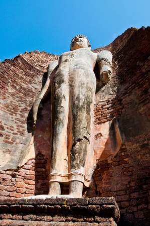 Standing buddha statue at Wat Phra Si Ariyabot temple, Thailand.の写真素材