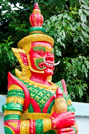 Red giant and golden dress, Thailand.の写真素材