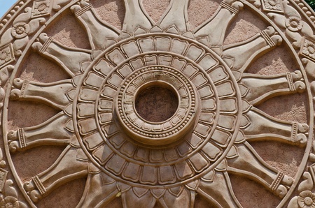 Detail of Dhammajak molding art at the temple, Thailand.の写真素材