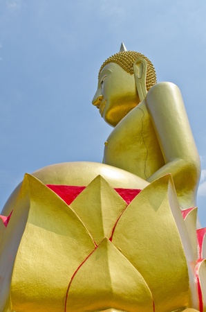 Beautiful buddha statue with blue sky, Thailand.の写真素材