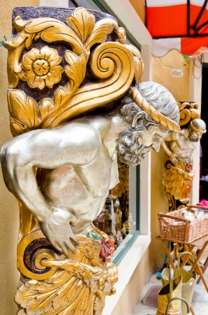 Silver molding statue on the wall, Thailand の写真素材