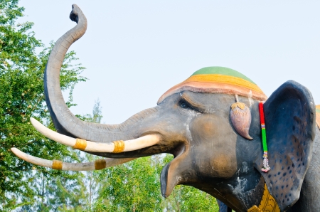 Head of elephant statue with blue sky, Thailand の写真素材