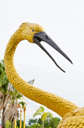Head of golden bird statue, Thailand.の写真素材