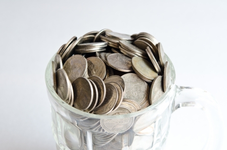 Group of coins in the glass, Thailand.の写真素材